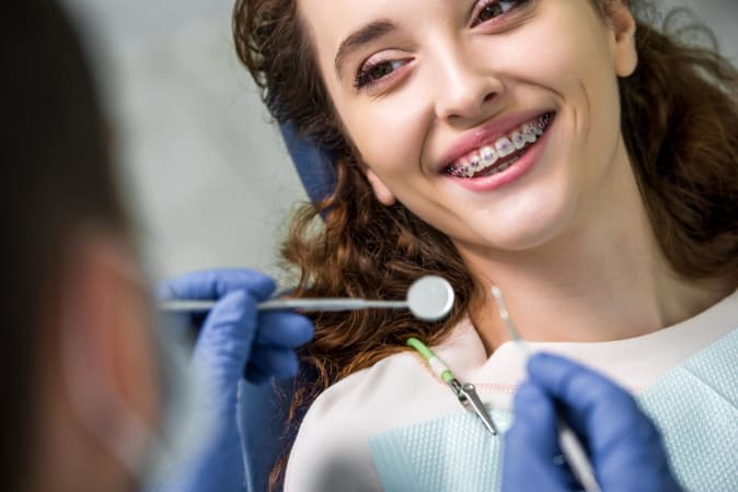 close-up-of-cheerful-woman-in-braces-during-examin-2021-08-30-01-25-26-utc-min-2048x1367